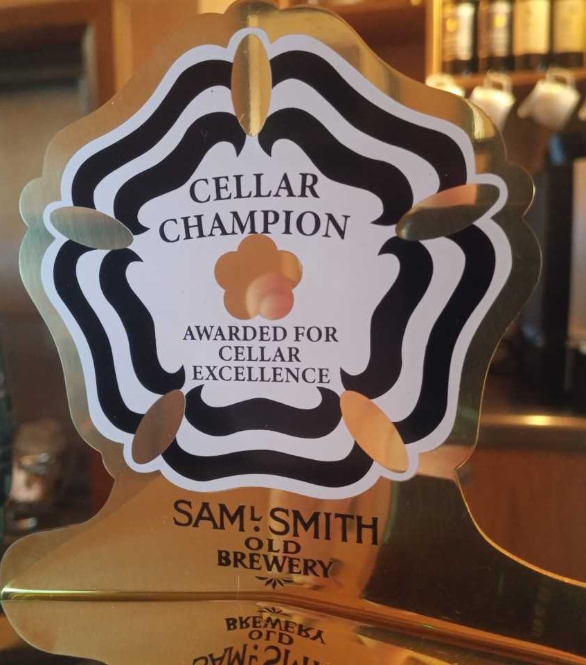 The Yorkshire Rose plaque on the Extra Stout font certifies that the beer at the Cock Tavern, Great Portland Street London, is of the highest quality. Our pubs are audited to check on cellar standards & the quality of beer keeping. Well done to Manager Bea as a Cellar Champion!