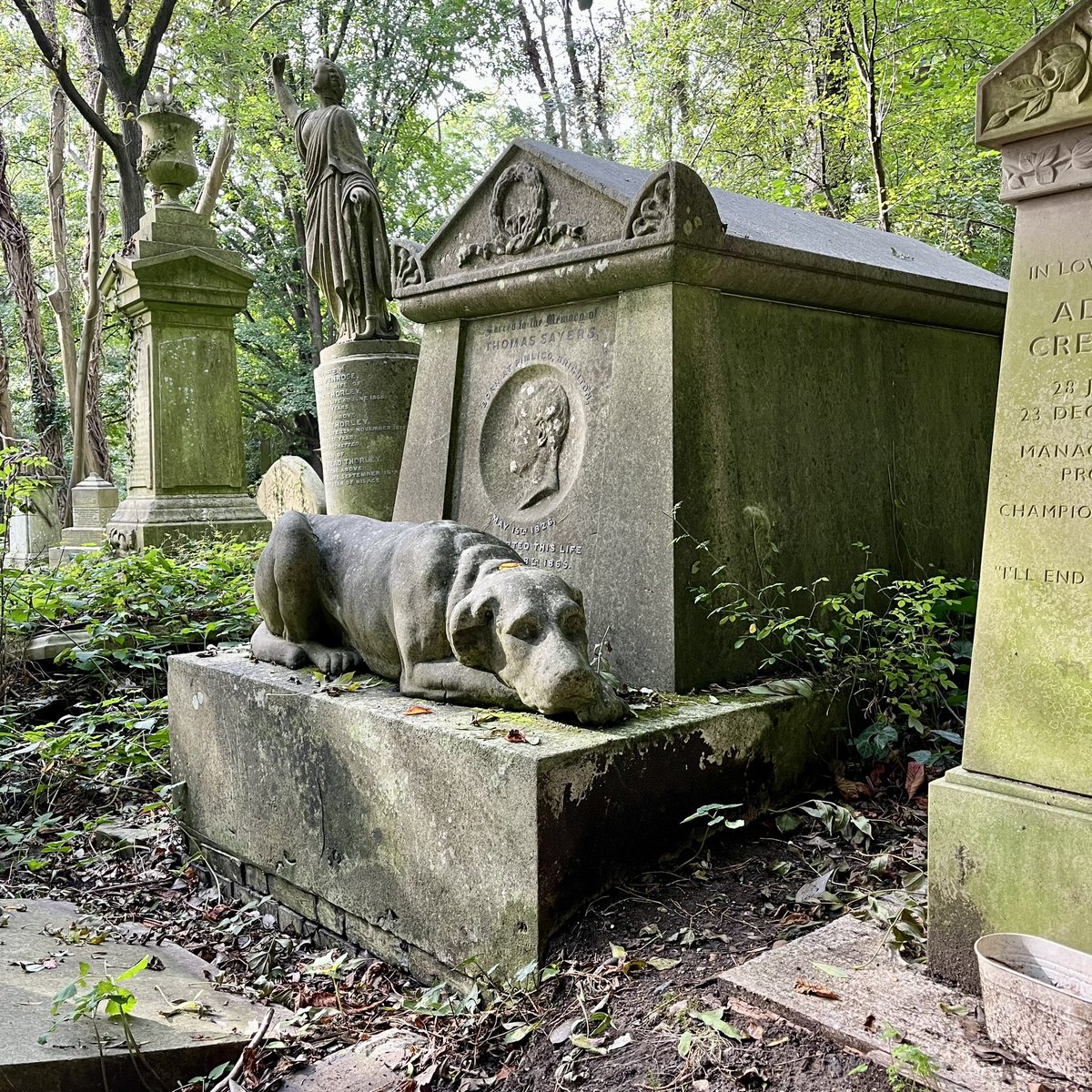 The tomb of Thomas Sayers (1826-1865) in Highgate Cemetery: a famous Victorian bare-knuckle boxing champion. His tomb is guarded by a sculpture of his pet dog, Lion.