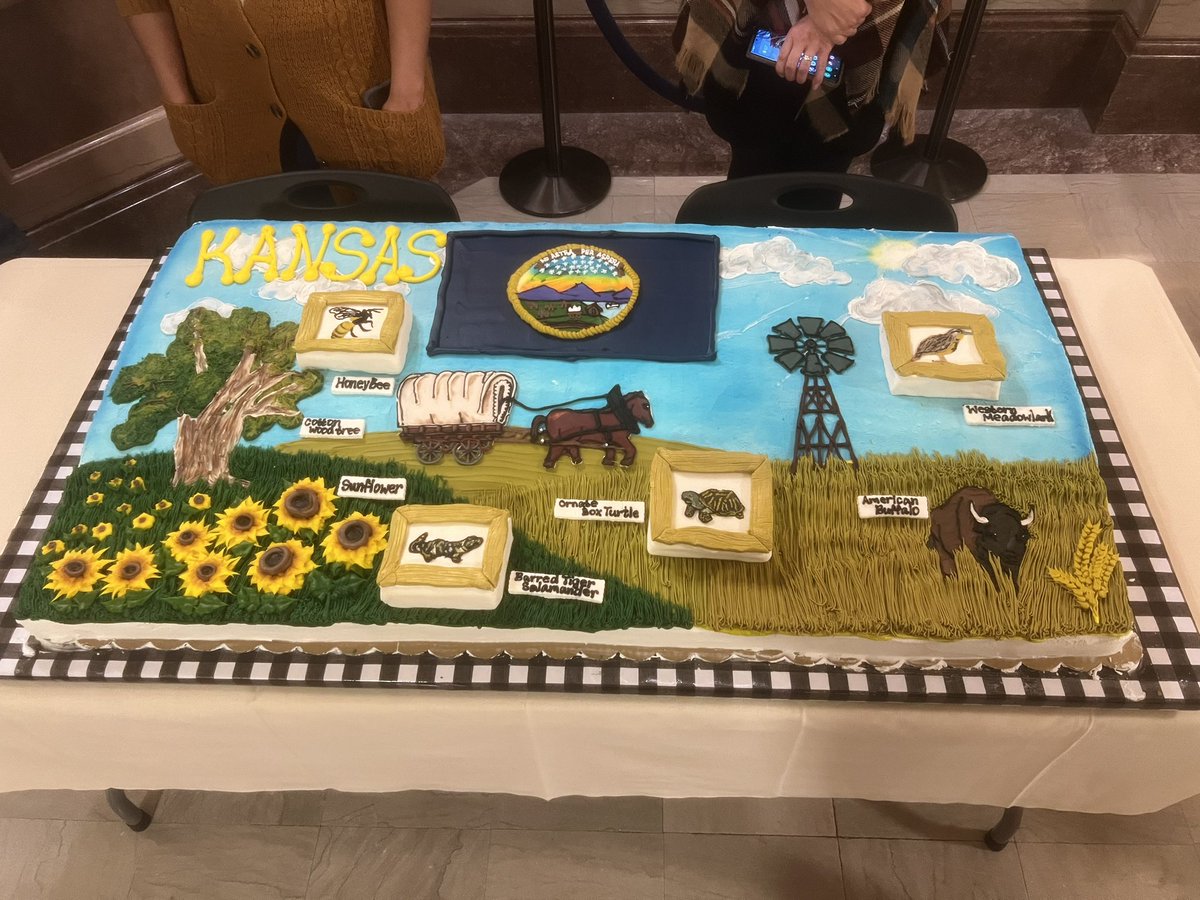 RichInNews's tweet photo. The Statehouse is celebrating Kansas Day. I’ve resisted the urge to take a small piece of the right corner to create a more state-accurate cake #ksleg https://t.co/T07pekpBgz