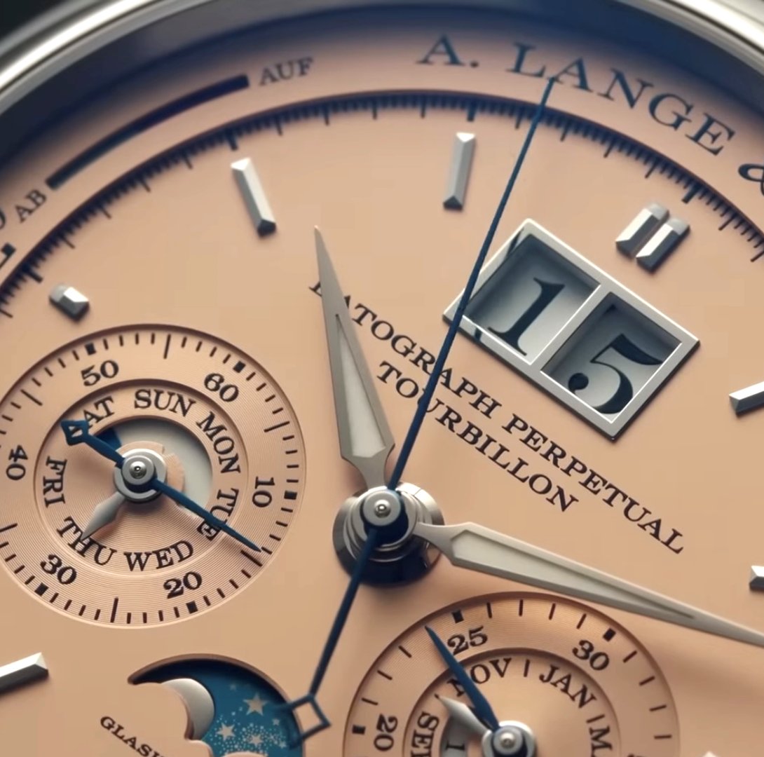 The A. Lange &amp; Söhne Datograph Perpetual Tourbillon

~ Functions:  PPC – Chronograph – Moon Phase – Tourbillon – Power Reserve 
~ Case: 41.5mm – White Gold – 14.6mm Thick
~ WR: 30M
~ Movement (L952.2) 50-Hour Power Reserve – Hand Wound –18,000 vph – 59 Jewels
~ MSRP: £245,200