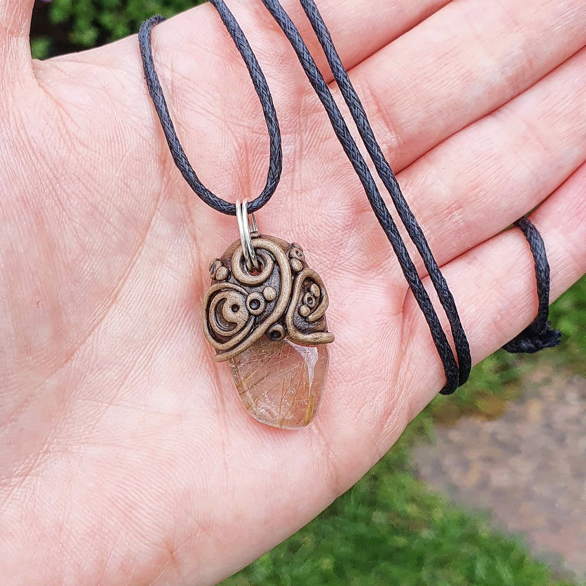 OrphicCrystal's tweet photo. This gorgeous #handmade rutilated #quartz #pendant is still available to adopt. I love the way it looks like there are rays of sunshine caught in the quartz. Such powerful #healing #crystals too 💛💛 £25 inc uk p&amp;p.
Dm or comment to  buy! 
#MondayMotivation #smallbiz #shopsmall https://t.co/TWxg2yTgF6