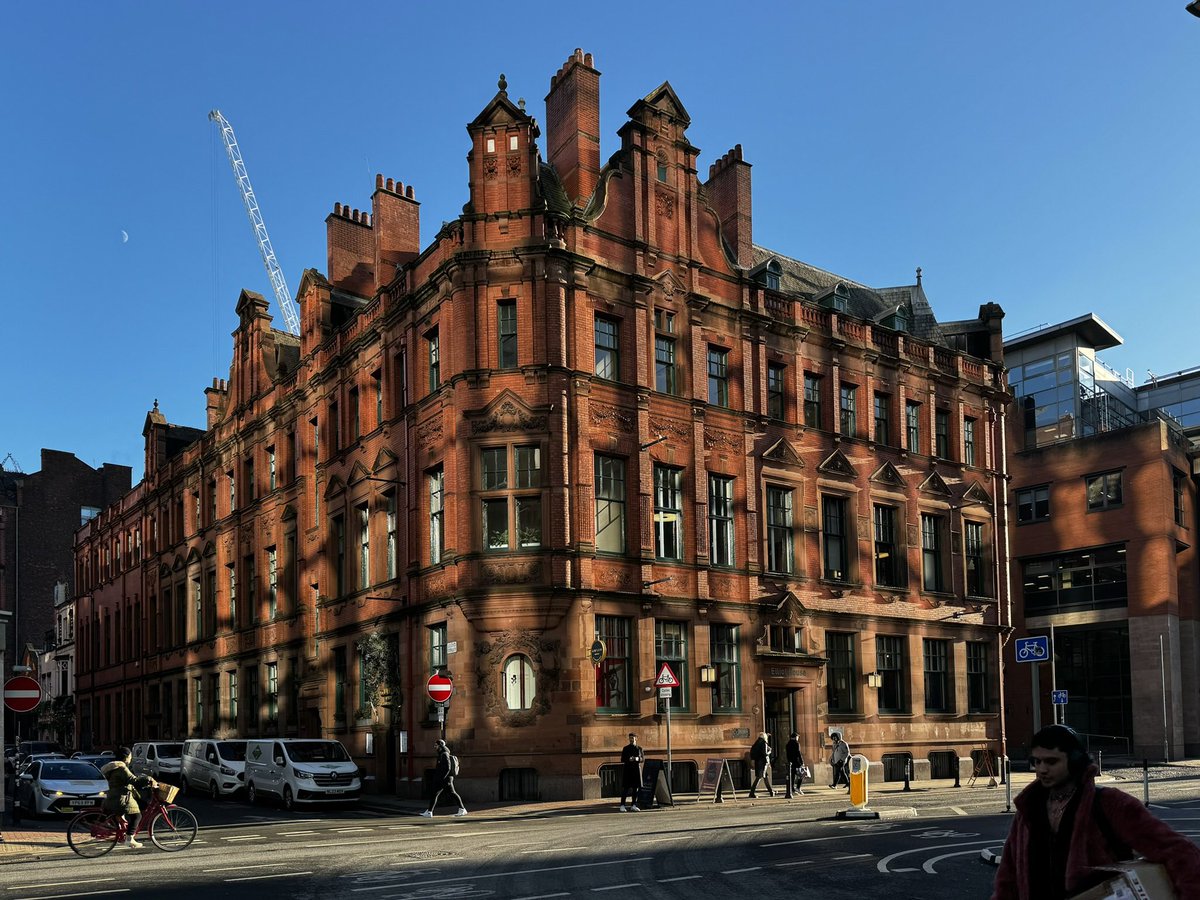 I had to stop and photograph Elliot House on #Deansgate in #Manchester—this red-brick Victorian building looking magnificent in the reflected light from the glass edifices opposite. Elliot House was designed by Royle &amp; Bennet and built in 1878. #architecture #photograghy
