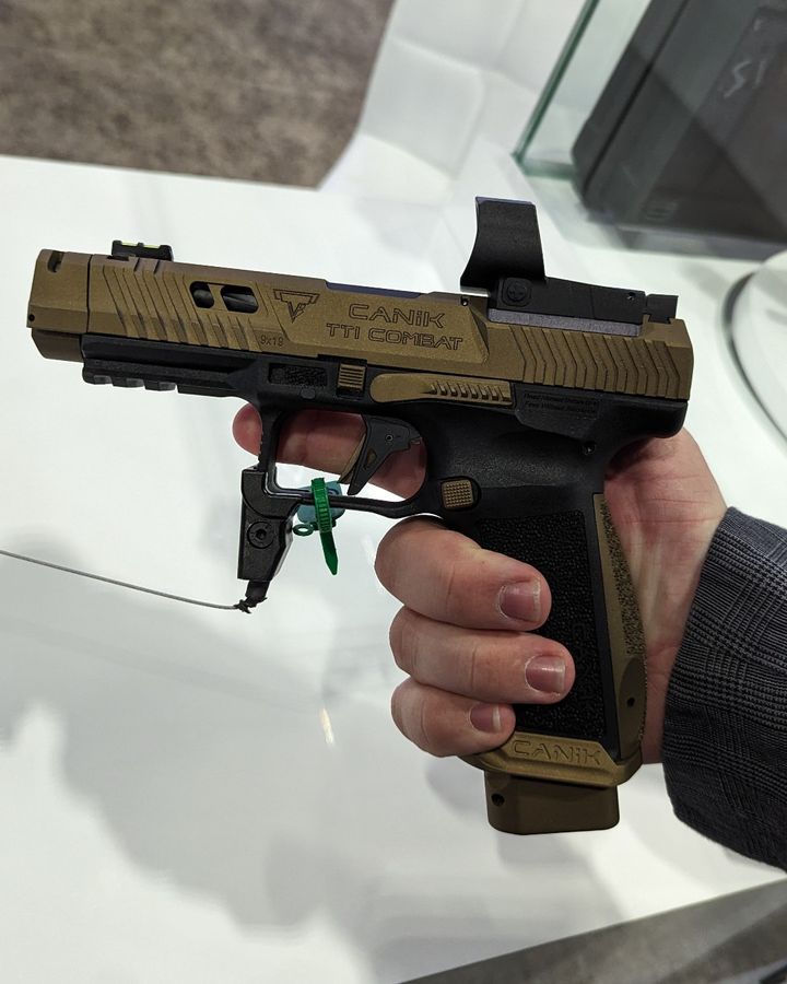 Got to check out the new @canikarms TTI COMAT colab with @TaranTactical
 at #ShotShow2024! 
.
What do you think of this pistol? Let us know in the comments! 
.
#TTICOMBAT #canik #taranbutler #TTI #opticsplanet