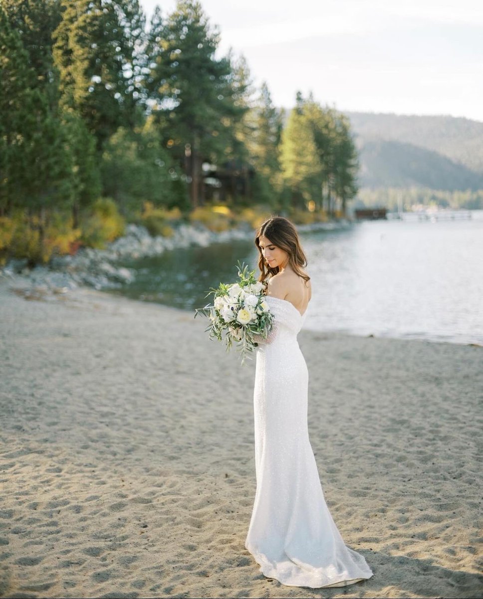 Taking a moment for our stunning bride <a href="/hannahbrooke77_/">Hannah Barros</a>  and her beautifully altered wedding gown @legacy_tailor!🪡👗Planning &amp; Design: @blueskyeventstahoe
Venue: Chambers Landing
Photography: @bethanyerinweddings
Dress: @elevatedbridal @evalendel @legacy_tailor