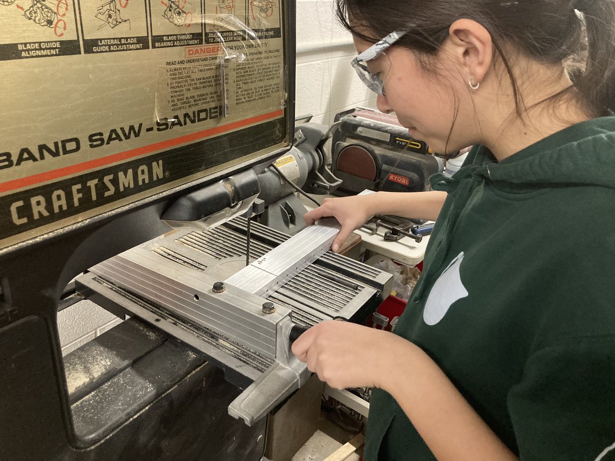 SingularityRobo's tweet photo. Carmen is cutting a piece of metal for our a new robot frame piece at the moment! @SalineHS @FRCTeams #shslearn #omgrobots https://t.co/JlBYXztJPF