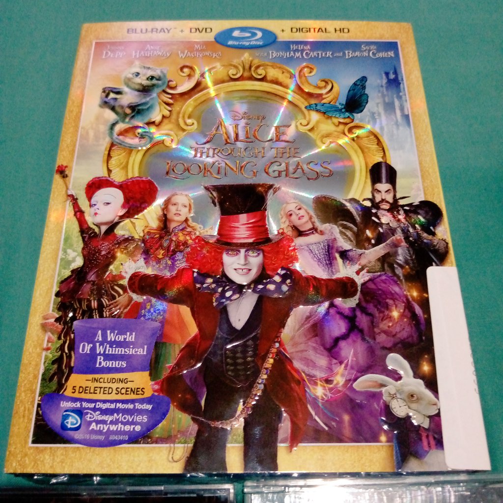 charsachz's tweet photo. More than my collection, this time Alice Through the Looking Glass DVD/Blu-Ray, OST and @Pink CD Single #JustLikeFire https://t.co/4K5LTBKEwL