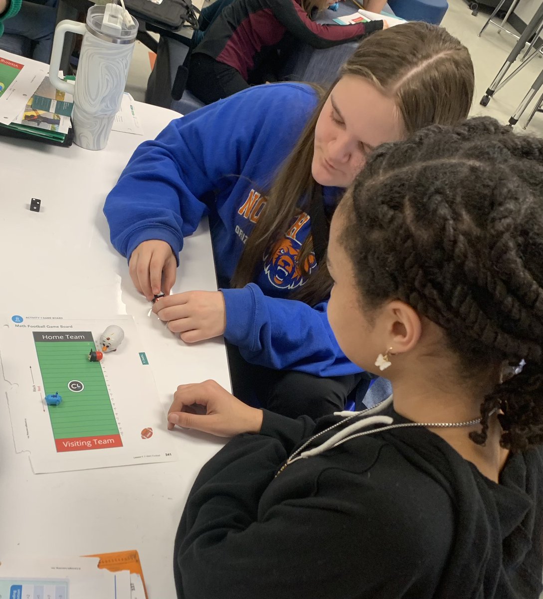 NPMS_Swanson's tweet photo. With the Super Bowl just two weeks away what better time to start adding and subtracting integers with a math football game complete with Disney characters as players. 😂 #itsagrizzlything #NPMSgrizzlies https://t.co/mOBuPJ47kT