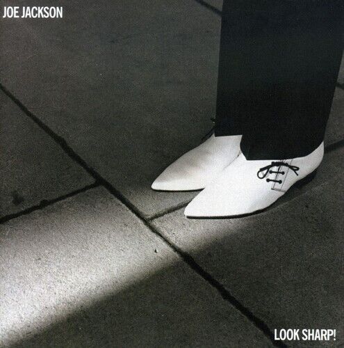 RIP Brian Griffin. This is my favourite LP cover: he once told me that he was sent to photograph Joe Jackson, took one look at him and thought 'I can't make this guy look like a rock star.' The he saw Joe's shoes.