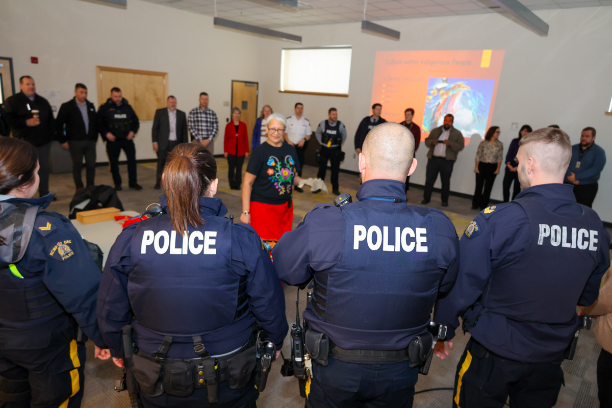 RCMPPEI's tweet photo. PEI RCMP had the privilege of hearing from Sarah Stewart-Jackson with the Native Council of PEI, who shared invaluable insights into Indigenous culture and her crucial role as the Coordinator for Murdered Missing Indigenous Women and Girls (MMIWG). #Reconciliation https://t.co/Sh2a7ZDIsY