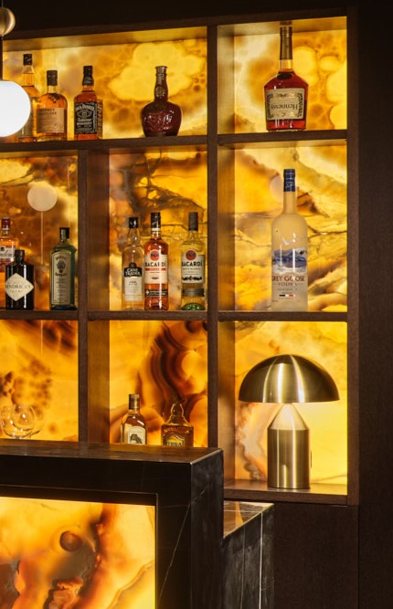 Project 7353. Dark stained oak Bar and Wine Room incorporating backlit  LED Onyx panels to create a truly amazing entertaining space #wineroomdesign #bardesign #bespokehomebar #himebar #wineroom #furnituremanufacturer