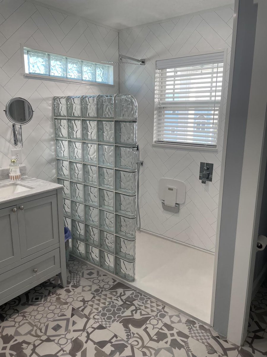 GlassBlockBlog's tweet photo. Glass block shower, glass block window, grout-free laminate shower wall panels. https://t.co/V6JrGd0ead