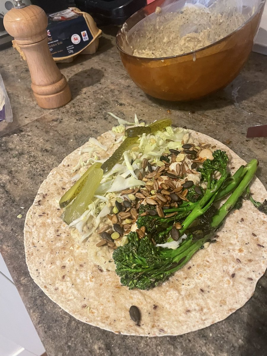 BassMidsTopsEtc's tweet photo. Freshly made baba ganoush, charred broccoli , chilli pickled garlic cloves, gherkin, shredded cabbage, toasted seeds, bish bash bosh #wrapgame https://t.co/QmKkrAE6Zd