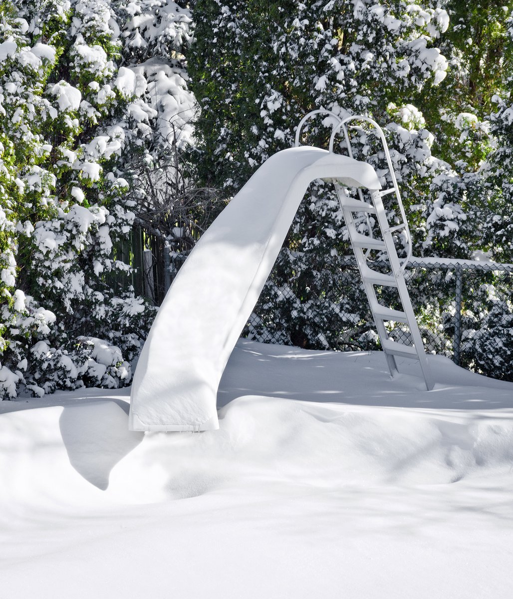 When the pool is closed for the winter, but still looks beautiful covered in snow. Anyone else ready for warmer weather?