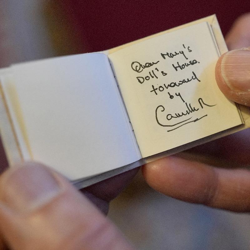 RoyalFamily's tweet photo. “These new books highlight the incredible richness of twenty-first century literary talent.”

The Queen has welcomed authors, illustrators and binders involved in creating special miniature books in celebration of the centenary of Queen Mary’s Dolls’ House.