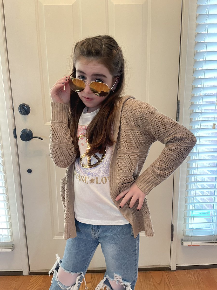 100th Day of School and 70’s Day, (70 days left of school)! When Ryan had to make this shirt in first grade, I got it a size big so he could use it for two years. He’s such a good sport, he’s wearing it for the 5th year in a row🤣 <a href="/BriarwoodES/">Briarwood Elementary</a>