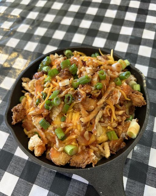 Our new deluxe buffalo loaded Mac & Cheese skillet… Mac & Cheese loaded with hand battered fried chicken tenders, green onions, fried onions, bacon, shredded cheese and hot sauce! Our kitchen is open til 7:30pm today!