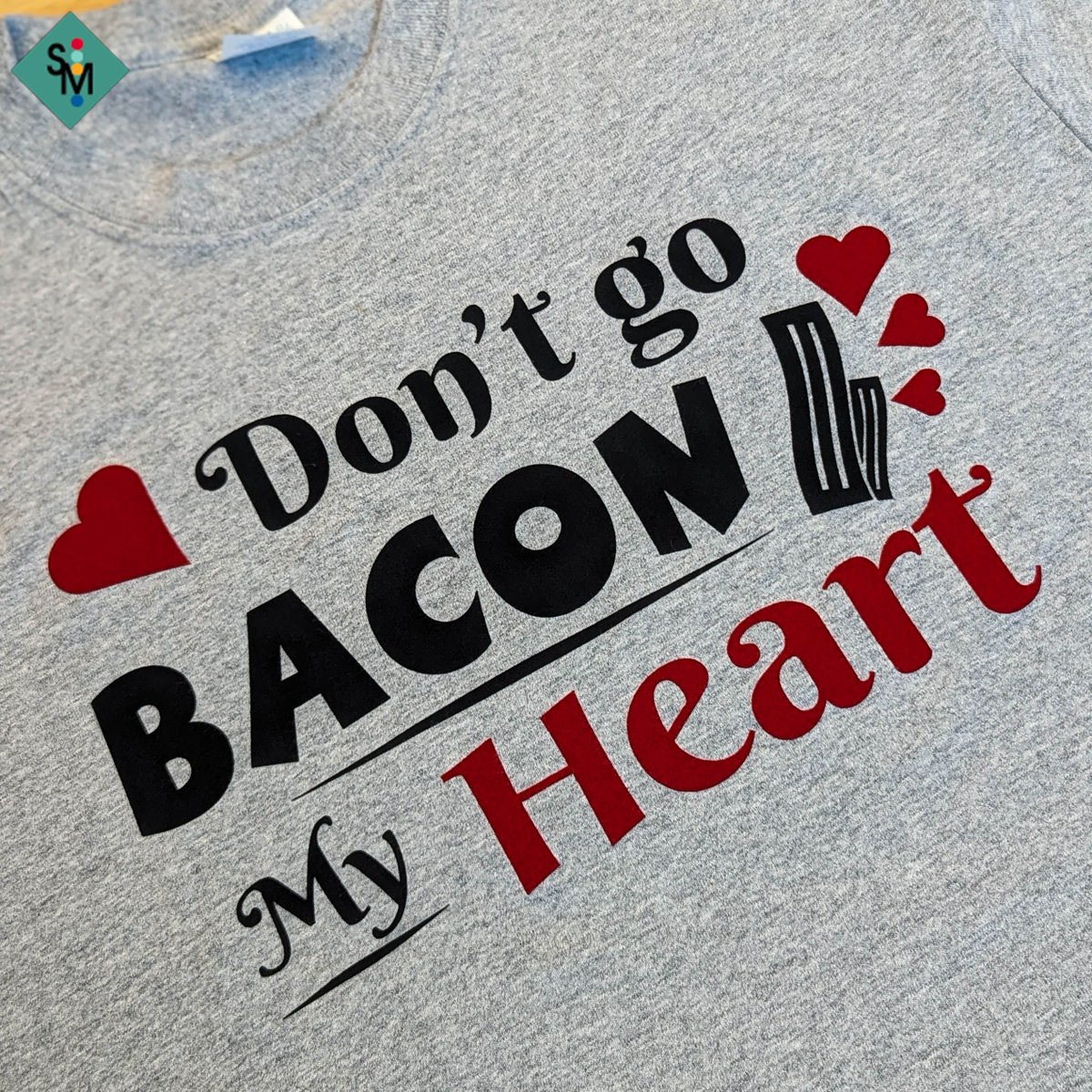 spcltymtrls's tweet photo. It's that time of the year again, and we're breaking out the cute and corny puns ❤️ We used DecoFLOCK®Premium Plus to make a sharp, crisp design that's soft to the touch. 

#htv #htvvinyl #vinyl #bacon #heart #valentines #heattransfervinyl #specialtymaterials https://t.co/e3c2oIe2rS