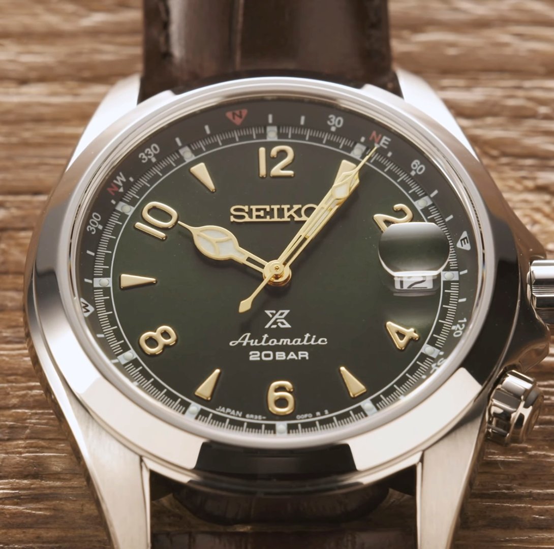 The Seiko Alpinist SPB121J1 ~ Functions: Date ~ Case: 39.5mm – Stainless Steel – 13.2mm Thick ~ Water Resistance: 200M ~ Movement ( Caliber 6R35 ) 70-Hour Power Reserve – Automatic – 21,600 vph Frequency – 24 Jewels ~ MSRP: £690