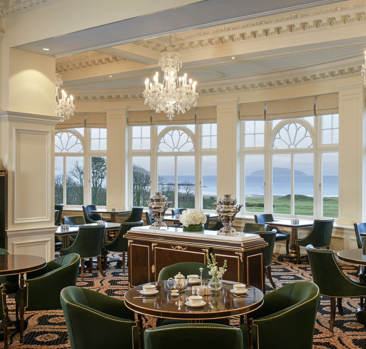 Discover the enchanting Grand Tea Lounge & Bar at @TrumpTurnberry , offering not only exquisite treats and premium beverages but also breathtaking views of the Alisa Craig on the Ayrshire coast.