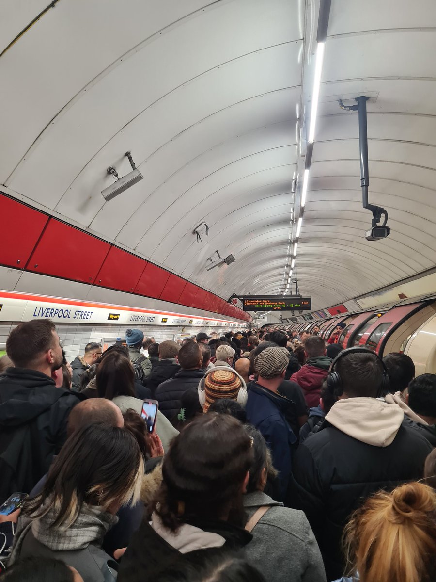 Georgia_Reid's tweet photo. Absolute madness at Liverpool Street this evening. The central line is, yet again, an absolute mess. Hundreds are not able to leave the platform due to lack of space, but whole tubes are being terminated, creating a crush of people. @TfL, what exactly are we paying for? https://t.co/GG1zkA3Bfd