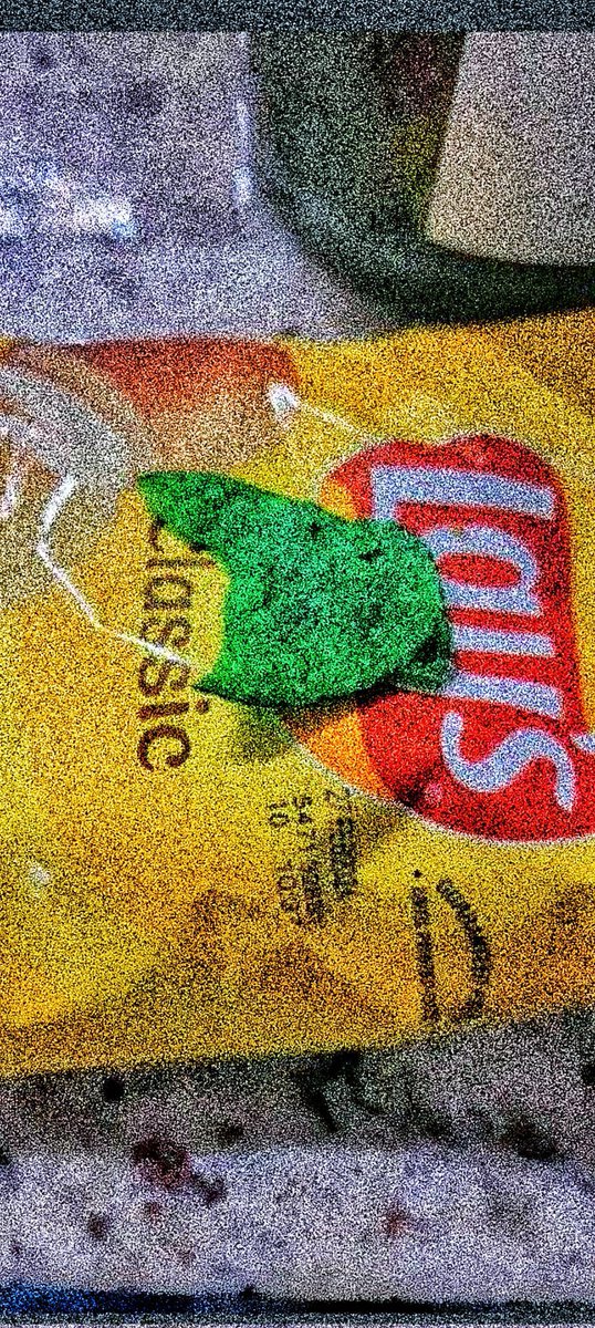 Found this weird sour-tastinf chip in my bag of Lay’s that makes my camera go all blurry when I take photos of it.