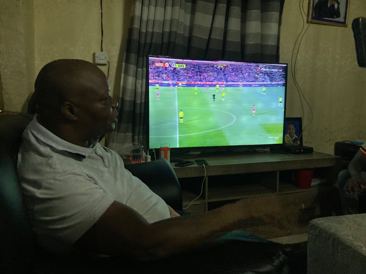 DougColtart's tweet photo. Job Sikhala is back in his home watching his beloved Arsenal. https://t.co/PWqkCvt24G