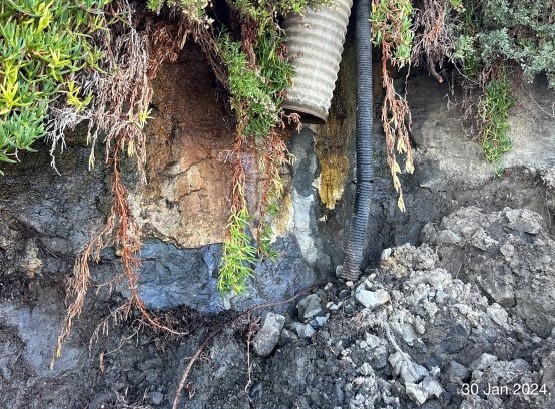 OCTA continues to work w/ <a href="/Metrolink/">Metrolink</a> and <a href="/CitySanClemente/">CityofSanClemente,CA</a> to stabilize the hillside and address drainage from the private property above #rail line near Mariposa bridge. No timeline for resuming service has been determined. Hill is being covered w/ plastic to prepare for rain.