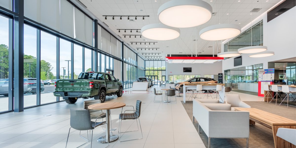 ChoateCo's tweet photo. Congratulations to the Summerville Nissan team on the grand opening of the Hudson Nissan dealership in SC! This two-story, 59,000-SF project facilitates Hudson's expansion in the Charleston area and offers an outdoor lounge and 24 service bays, plus 2 alignment bays. https://t.co/vsic2Hm1Gc