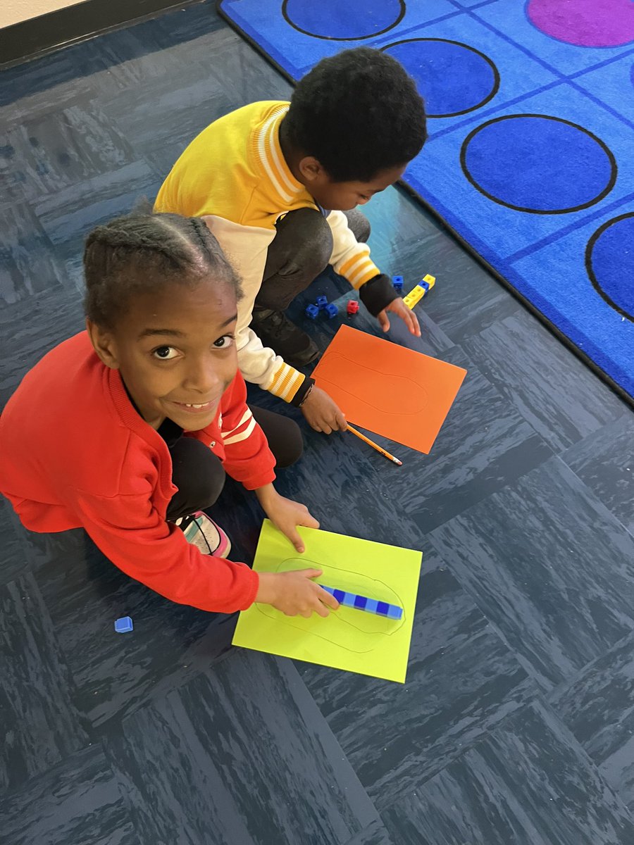 garrison3_mrs's tweet photo. Students had a blast taking ownership of their learning today! They traced their partners foot. Measured each foot with unifix cubes, compared the two measurements , and shared their measurements with the class! 
#oneteamonedream
#winningforkids
##unitymakesusgreat
@UGE_HCS https://t.co/zPe5G5oa0Y