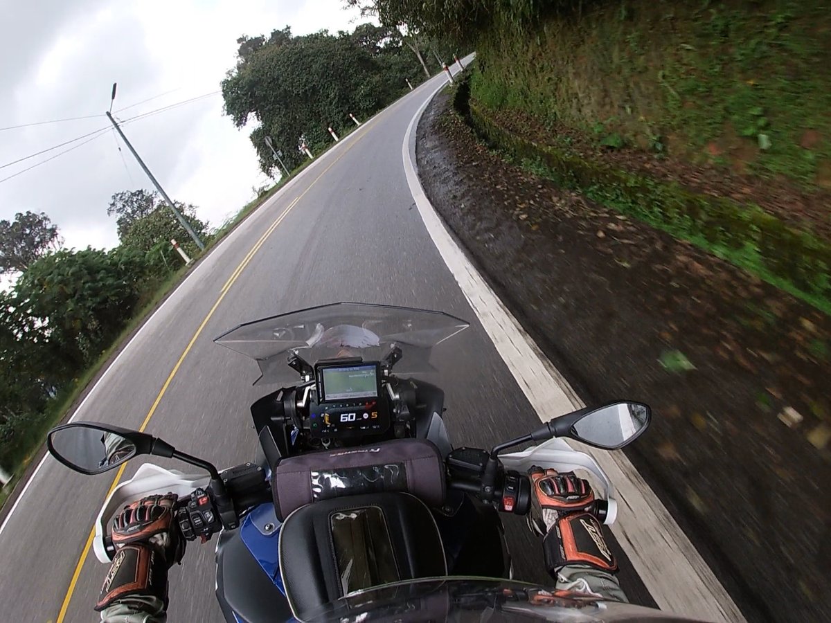 A thousand twists and a thousand turns on the serpentine switchbacks of the misty Nyungwe Forest National Park