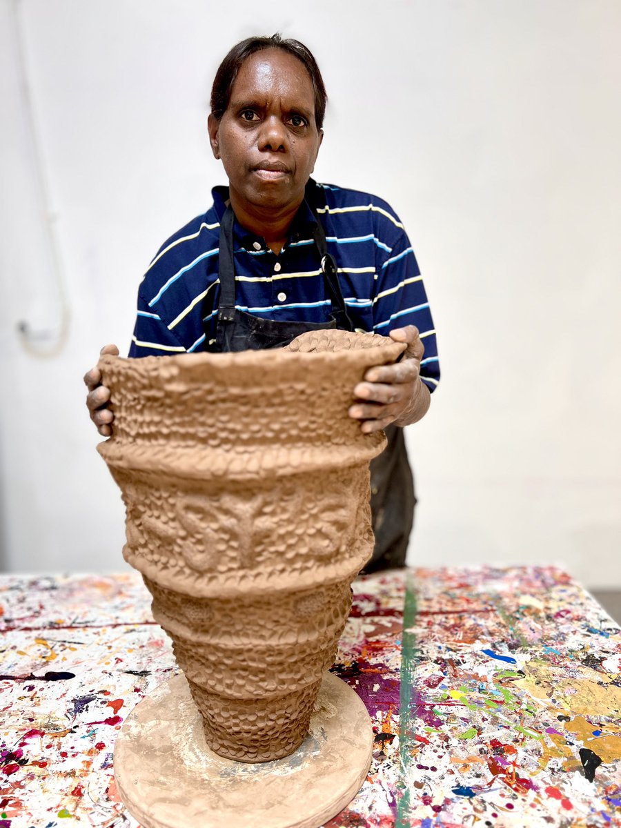 Josina Pumani with her powerful new ceramic works. Josina is the niece of the great APY leader Yami Lester. Josina with her new works is holding onto the family tradition of advocating for Aṉangu in response to the Maralinga bomb testing. Her forms depict the plumes of smoke.