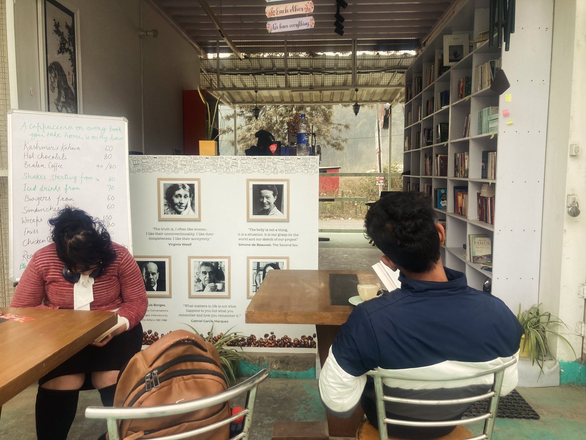 Two readers @casakundera , lost in their books on a cloudy day, very different from each other and yet the same in the essence.

What can be more fulfilling a scene than this for another reader and a lover of all things books. 

#booksarelove #readersarelove #bookcafesarelove