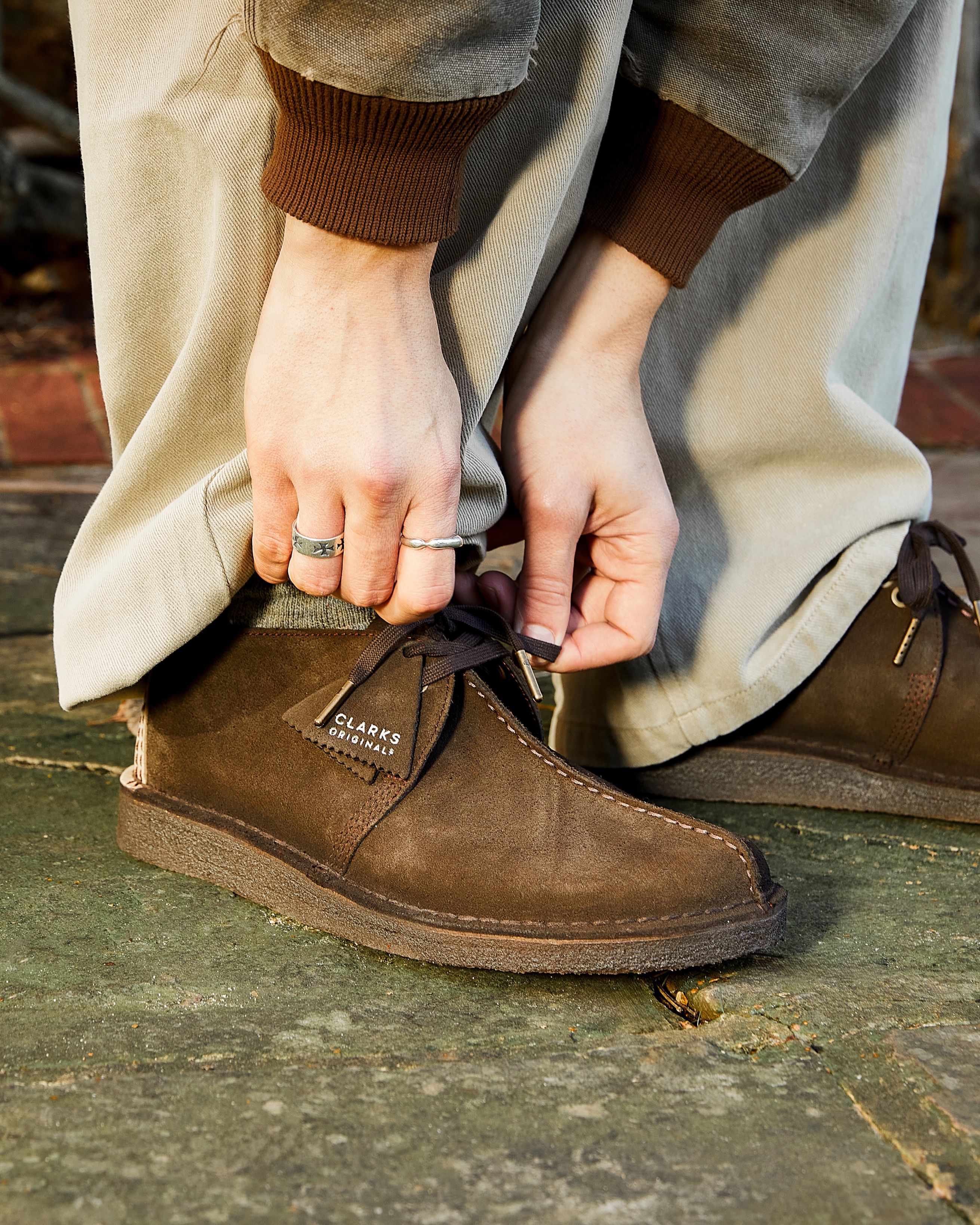 TOWER London on X Upgrade your footwear collection with these timeless Clarks Originals Desert Trek Boots in rich brown suede. The contrast stitching adds a refined touch making these boots a versatil...
