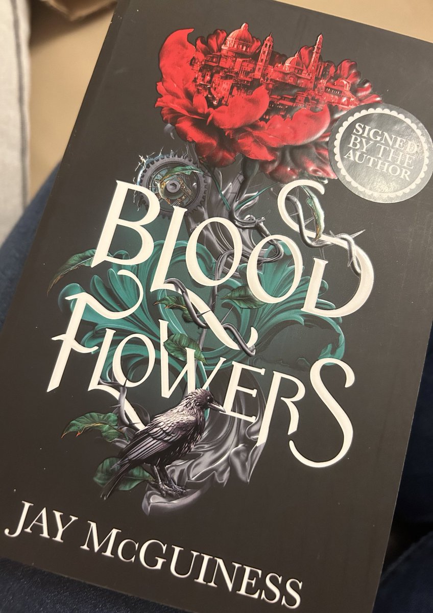 Sarah___Mary's tweet photo. Awful day at work… Storm coming in… but I’ve arrived home to this.. @JayMcGuiness. Know what I’m going to be doing with a cuppa and blanket tonight!! #cosynightin #bloodflowers #booklover #cantwaittoread https://t.co/rT5PYy3lVh