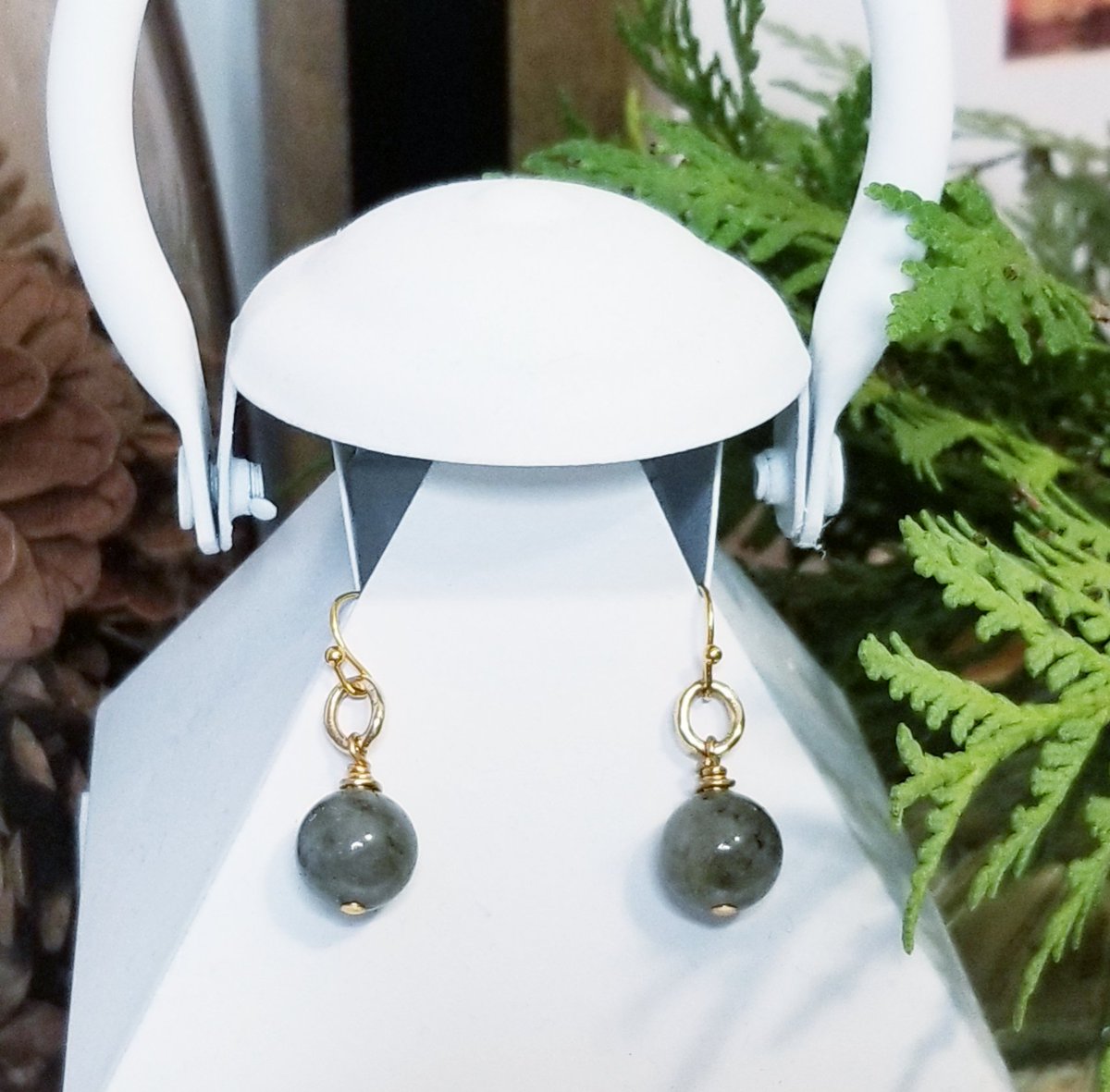 These earrings are a must-have for everyday wear. The Sweet Lady features a stunning Labradorite stone with gold accents. They are comfortable and versatile, perfect for any style. #sandalomadesigns #labradorite #wearsandaloma #jewelry #fashion #Jewellery #earrings #handmade