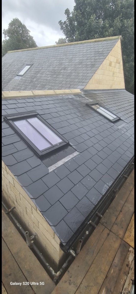 New extension roof, joining seamlessly into the existing roof, completed using #cupapizarras R12 Spanish slates and new #velux windows