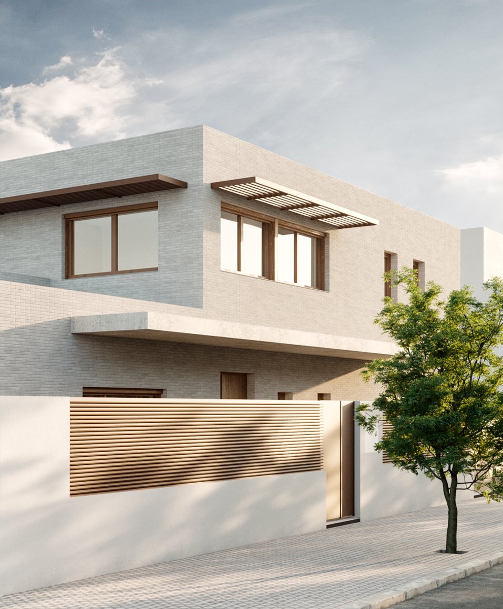 La fachada a calle de la vivienda se muestra menos abierta para proteger la privacidad, contrastando con una fachada posterior abierta al jardín. Un voladizo continuo protege la entrada y contrasta con la materialidad del ladrillo caravista.

#arquitecto #passivhaus