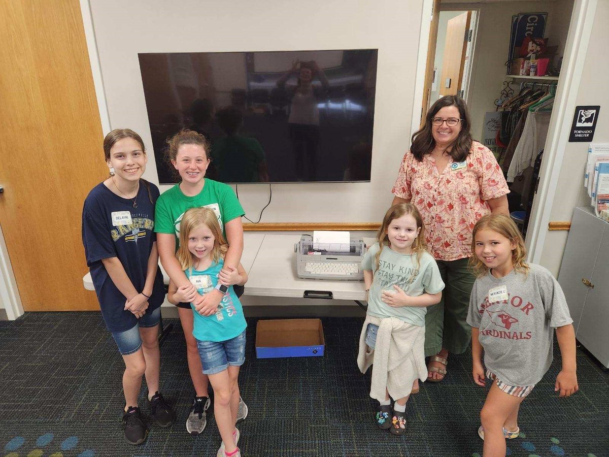 GSNEO's tweet photo. Troops 50195 and 50174 participated in summer reading programs last summer. They finished with a library tour at @GraftonPL to learn how the library runs. They even got to use a typewriter and see the Dewey decimal system! 📚 ✨ #TroopTuesday https://t.co/CUuKMDLayF