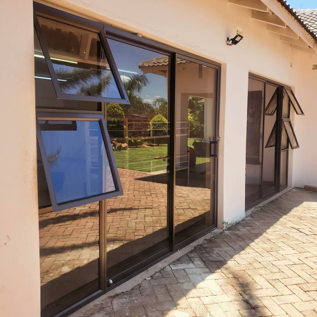 margchash's tweet photo. 700 series patio sliding doors with sidelights, glazed with bronze tinted glass.

We are a call away for all you ALUMINIUM &amp; GLASS requirements, we fabricate and deliver everything custom made to your preferred designs and colors.

@margchash
#Aluminiumandglass 
+263 783 574 677 https://t.co/hXwRBMSmg6