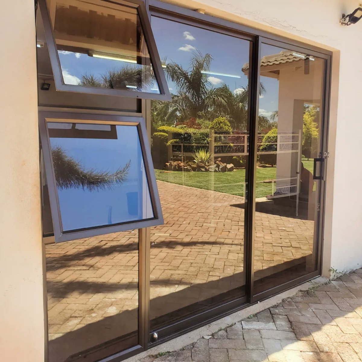 margchash's tweet photo. 700 series patio sliding doors with sidelights, glazed with bronze tinted glass.

We are a call away for all you ALUMINIUM &amp; GLASS requirements, we fabricate and deliver everything custom made to your preferred designs and colors.

@margchash
#Aluminiumandglass 
+263 783 574 677 https://t.co/hXwRBMSmg6