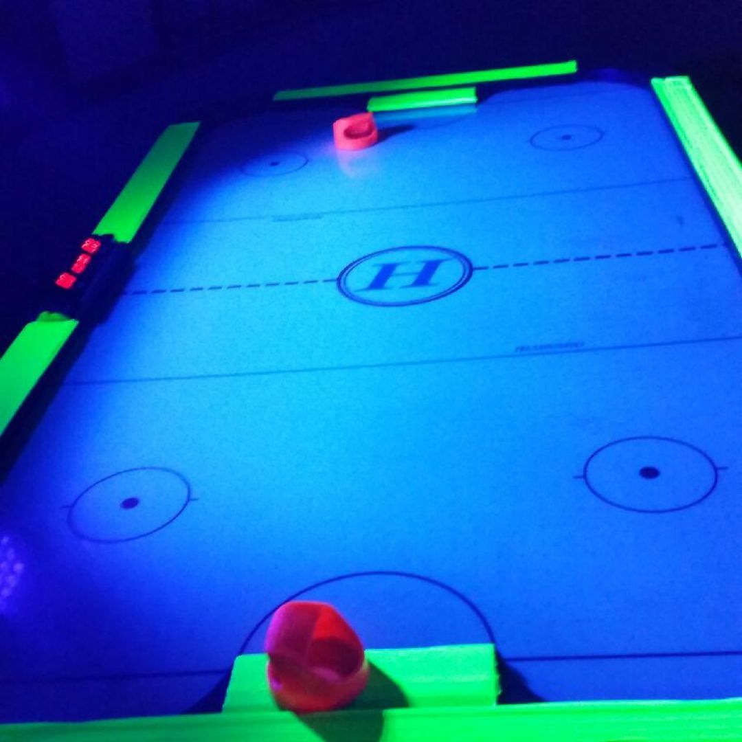 Two opponents battle it out on the slick surface of the air hockey table, their paddles clashing in a fast-paced game of strategy and skill.

Are you going to be the winner? 

#party #birthday  #fun #friends #inflatablebouncehouse #bouncyhouse