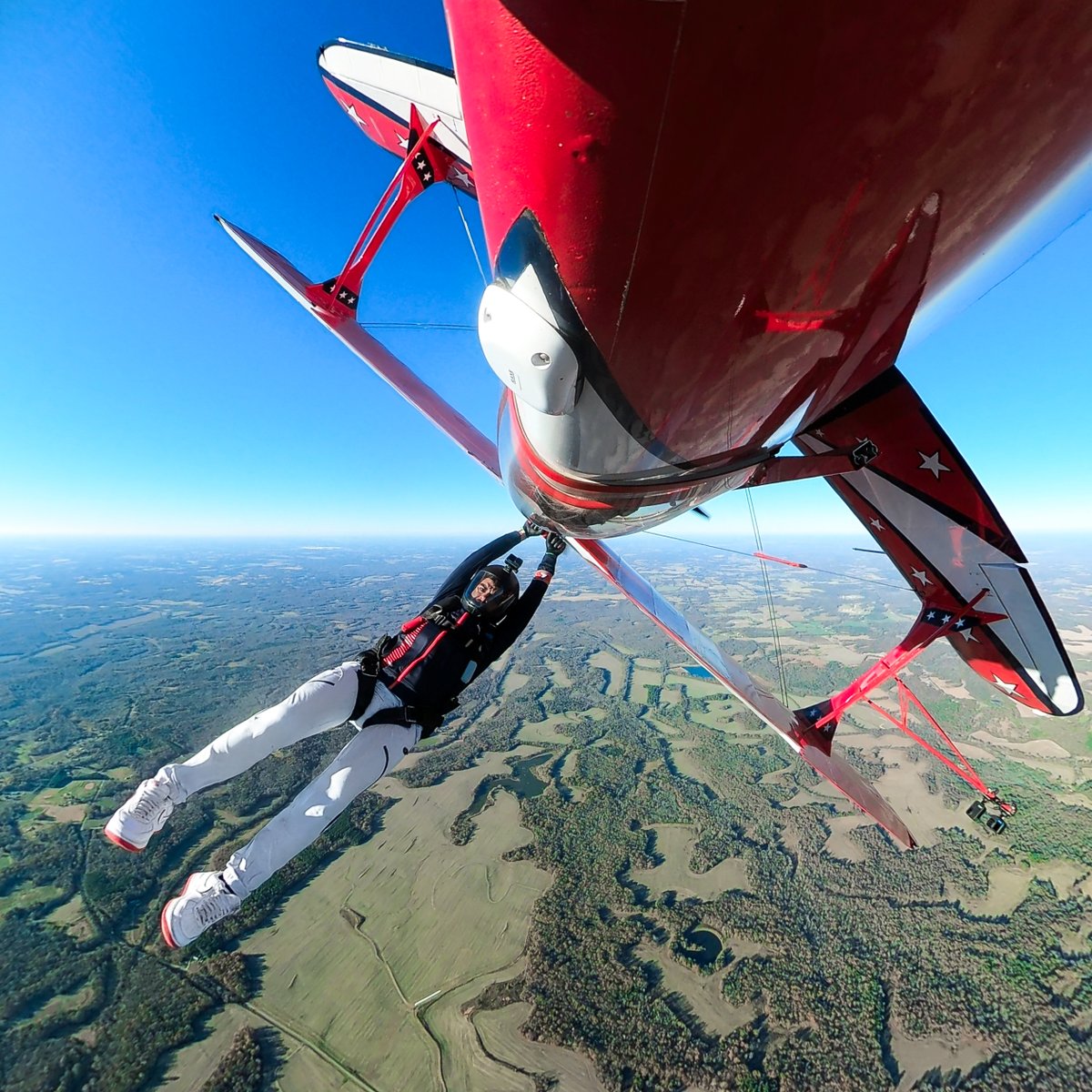 GoPro's tweet photo. Photo of the Day: Your unemployed friend on a Wednesday 👆 Shot on #GoProMAX by GoPro Subscriber Joshua Laquis, who earned $500 for this adrenaline spike 📈

#GoPro #Skydiving #WingWalking #Skydive #Aviation #StuntPlane https://t.co/IJgSCaDzsV