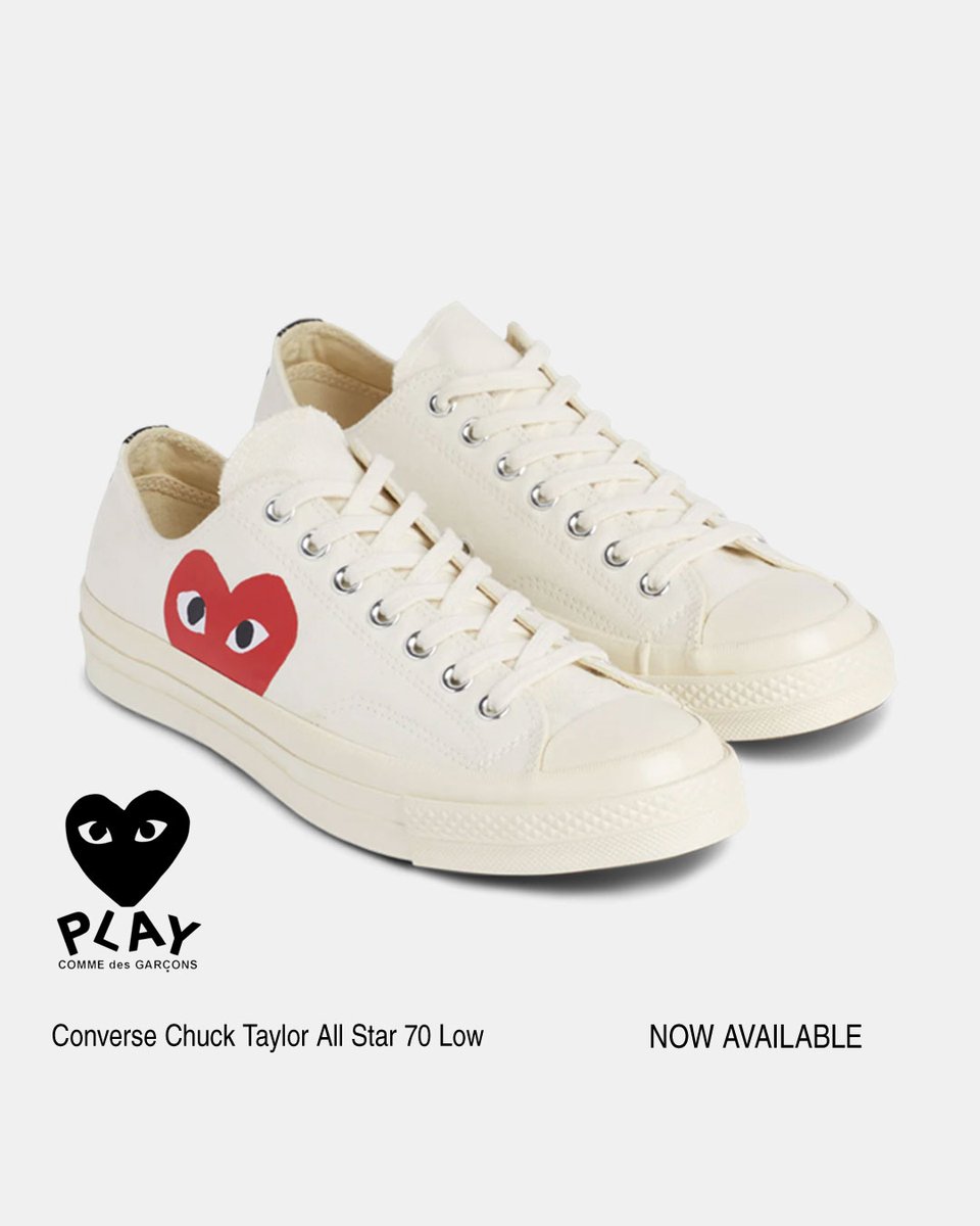 The <a href="/COMMEdesGARCONS/">@COMMEdesGARCONS</a> PLAY Converse Chuck Taylor All Star 70 Low is a classic low top sneaker featuring a lace-up fastening for a secure fit. 

It is adorned with a printed red heart, adding a playful touch to the design.