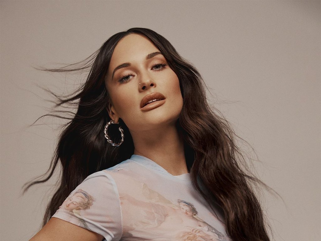 PopTingz's tweet photo. Kacey Musgraves performed four new songs at a recent fan event in New York. 

The songs are allegedly titled: “Cardinal”, “Deeper Well”, “Too Good To Be True” and “Heaven”.

The new album is probably finished, and a tour is scheduled to take place during September-December. 

The tracks sound closer to Kacey's first three albums than her most recent, “star-crossed.”