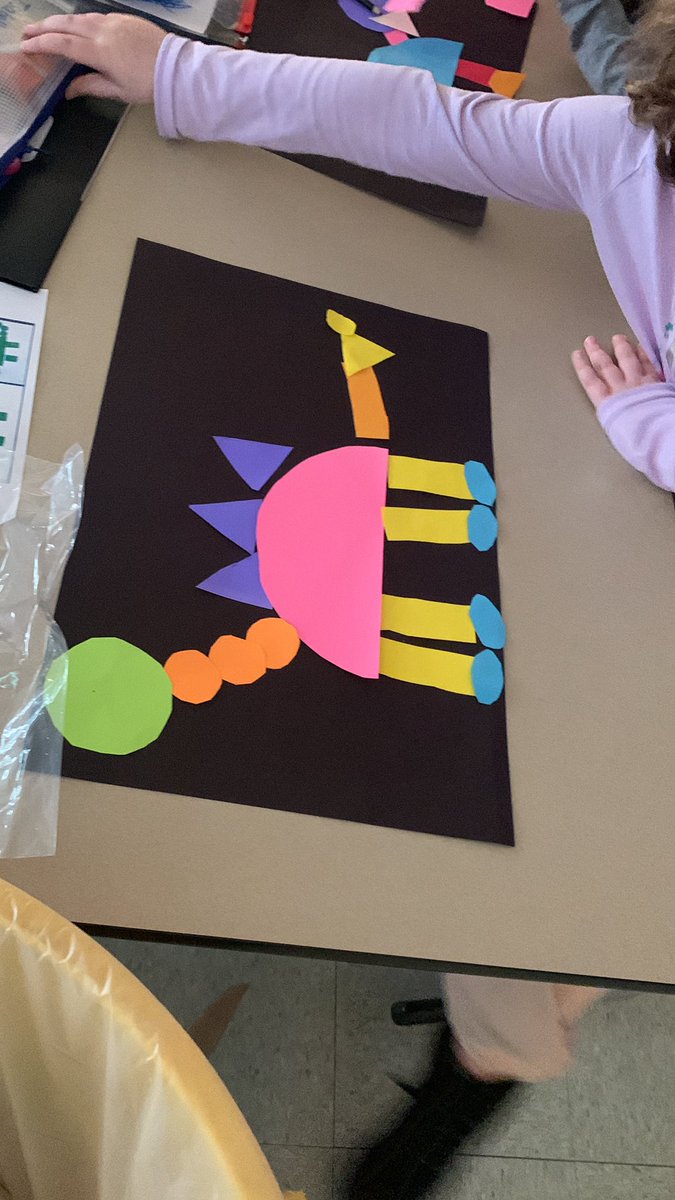 First Grade geometric dinosaurs are glowing! #ilbsd13 #leadlikeajaguar