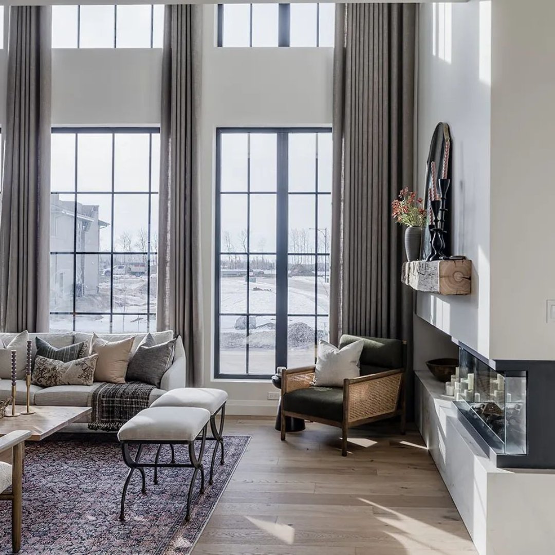 Large windows make high ceiling living rooms feel even more spacious and inviting, creating an atmosphere that's perfect for relaxation and gatherings.☁️

#Durabuilt #AllAboutYou #windowsanddoors #interiordesign #architecture #modernhomes #homedesign #homeinspo #livingroomdesign