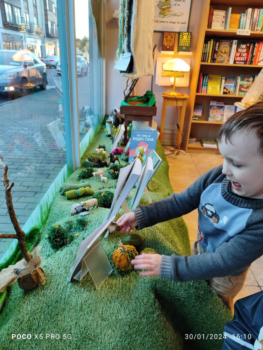 SeanchaiB's tweet photo. Our St Brigid's window is inspired by Brigid's Curragh where she spread her cloak. With thanks to Joanne McWey for working in the cold weather to produce her beautiful cloak. Also to @KildareCoCo for the Shop Window Grant and SULT artists for the art. 
#brigid1500 #kildare https://t.co/avGb7zX008