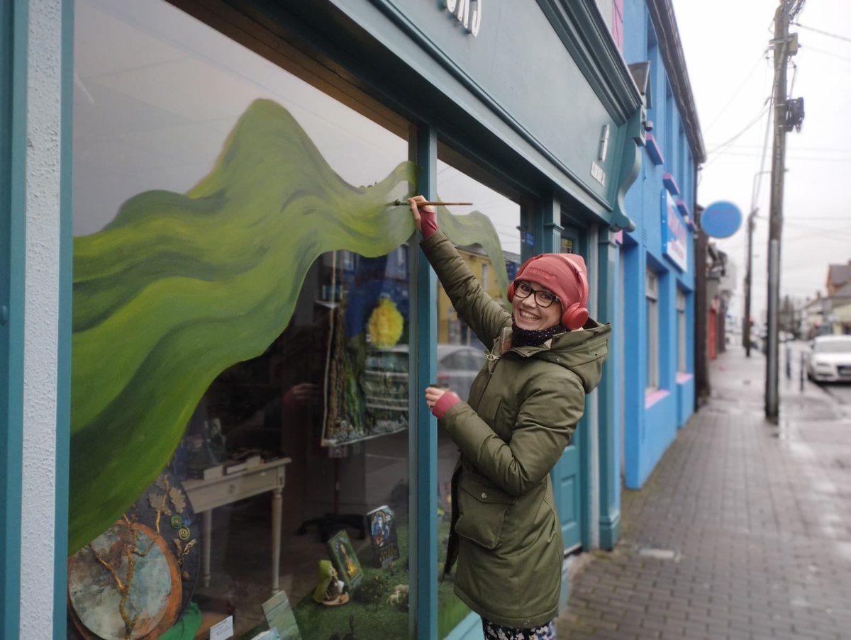 SeanchaiB's tweet photo. Our St Brigid's window is inspired by Brigid's Curragh where she spread her cloak. With thanks to Joanne McWey for working in the cold weather to produce her beautiful cloak. Also to @KildareCoCo for the Shop Window Grant and SULT artists for the art. 
#brigid1500 #kildare https://t.co/avGb7zX008