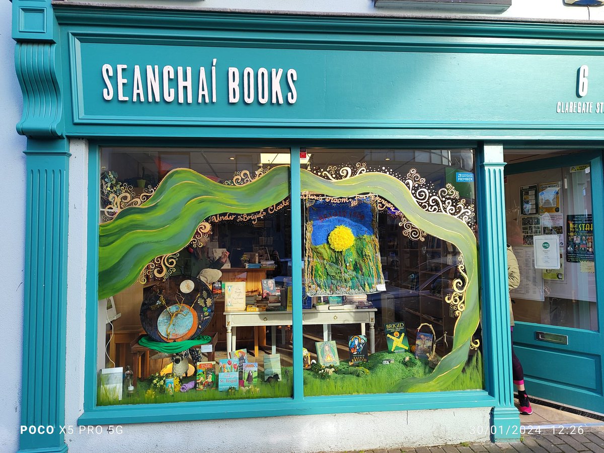 SeanchaiB's tweet photo. Our St Brigid's window is inspired by Brigid's Curragh where she spread her cloak. With thanks to Joanne McWey for working in the cold weather to produce her beautiful cloak. Also to @KildareCoCo for the Shop Window Grant and SULT artists for the art. 
#brigid1500 #kildare https://t.co/avGb7zX008