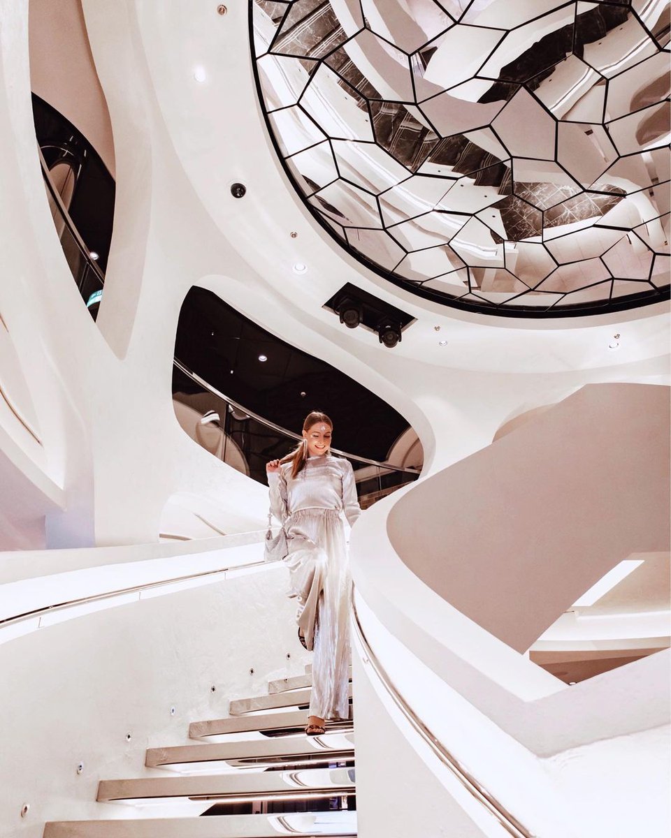 With her sleek design, each area and corner on board MSC World Europa presents a new wonder to be discovered. 📷 Discover more about MSC World Europa shorturl.at/rCESX  IG  📷:@theblondeflamingo